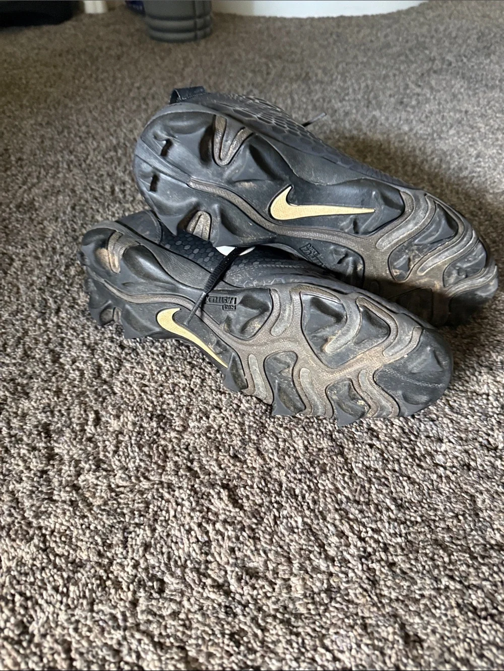 Nike Black Cleats with White Swoosh